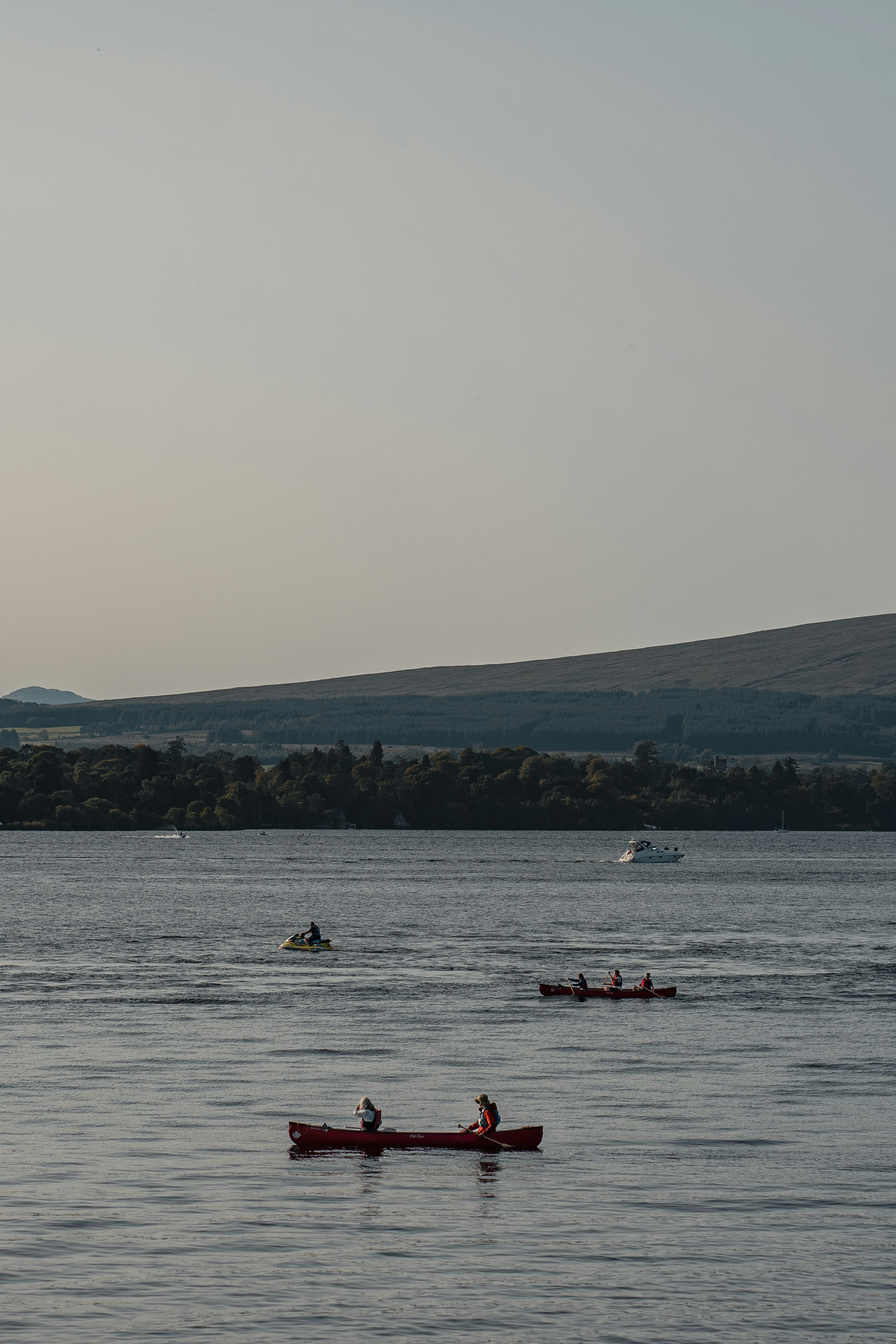 people riding on boat on sea during daytime